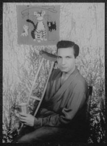 Ben Gazzara in a publicity shot posing with a crutch.