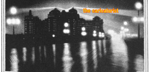 atlantic city boardwalk at night in black and white with "the caricaturist" in the upper right hand corner.